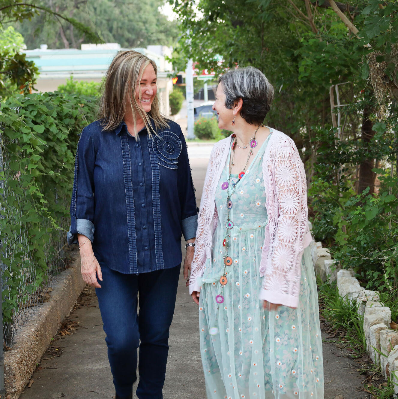 photo of Karen and Michele Smiling and walking